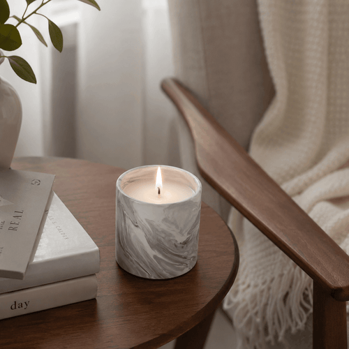 Warmelle Maris candles styled on a coffee table